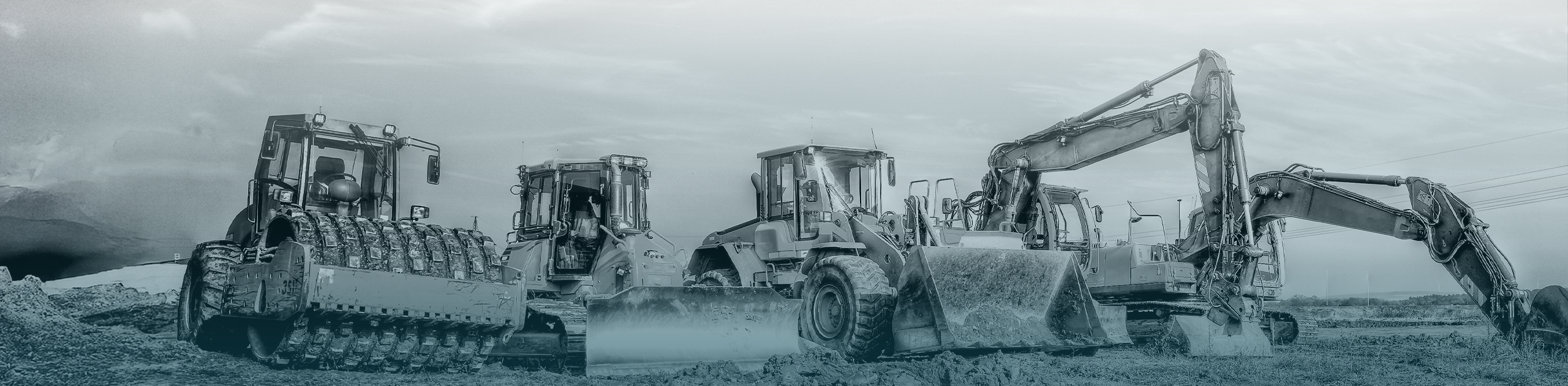 verschiedene Baumaschinen auf Baustelle