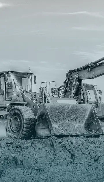 verschiedene Baumaschinentypen auf einer Baustelle verschiedene Baumaschinentypen auf einer Baustelle